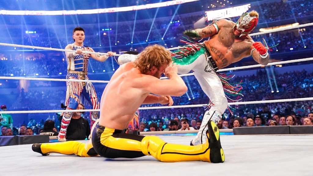 Dominik Mysterio, Rey Mysterio and Logan Paul 