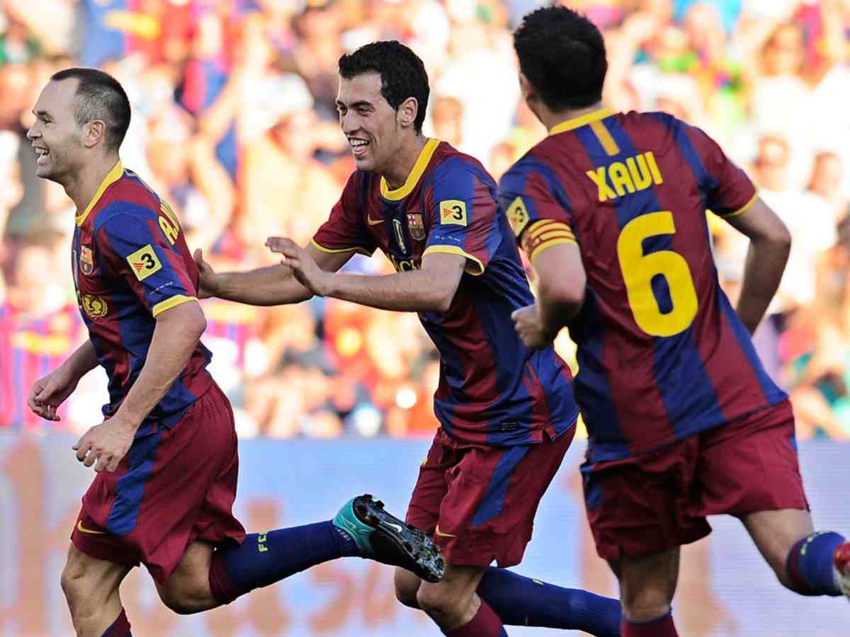 Andres Iniesta, Sergio Busquets and Xavi for Barcelona