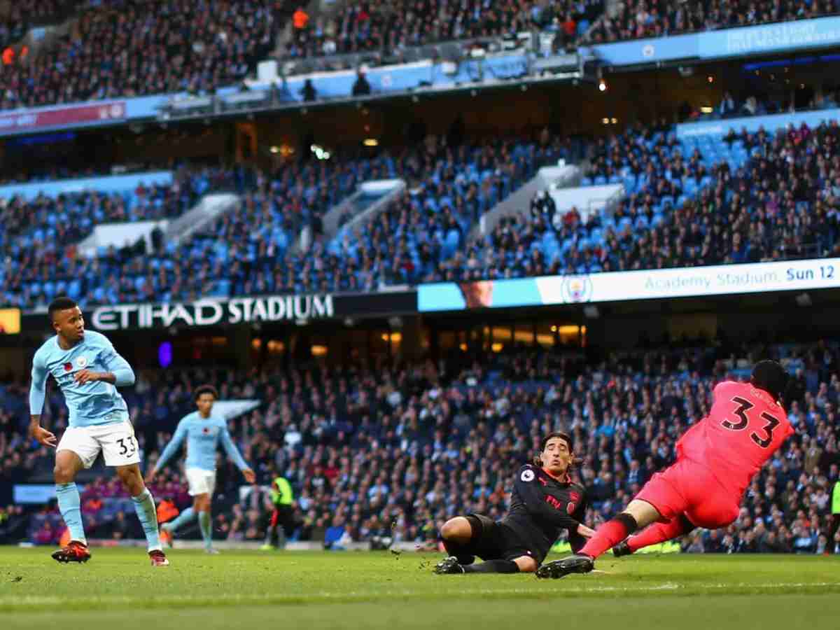 Gabriel Jesus, for Manchester City, scoring a goal against Arsenal in 2017.