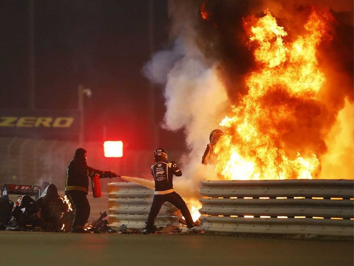 Romain Grosjean gets out of a flaming cockpit at the 2020 Bahrain GP