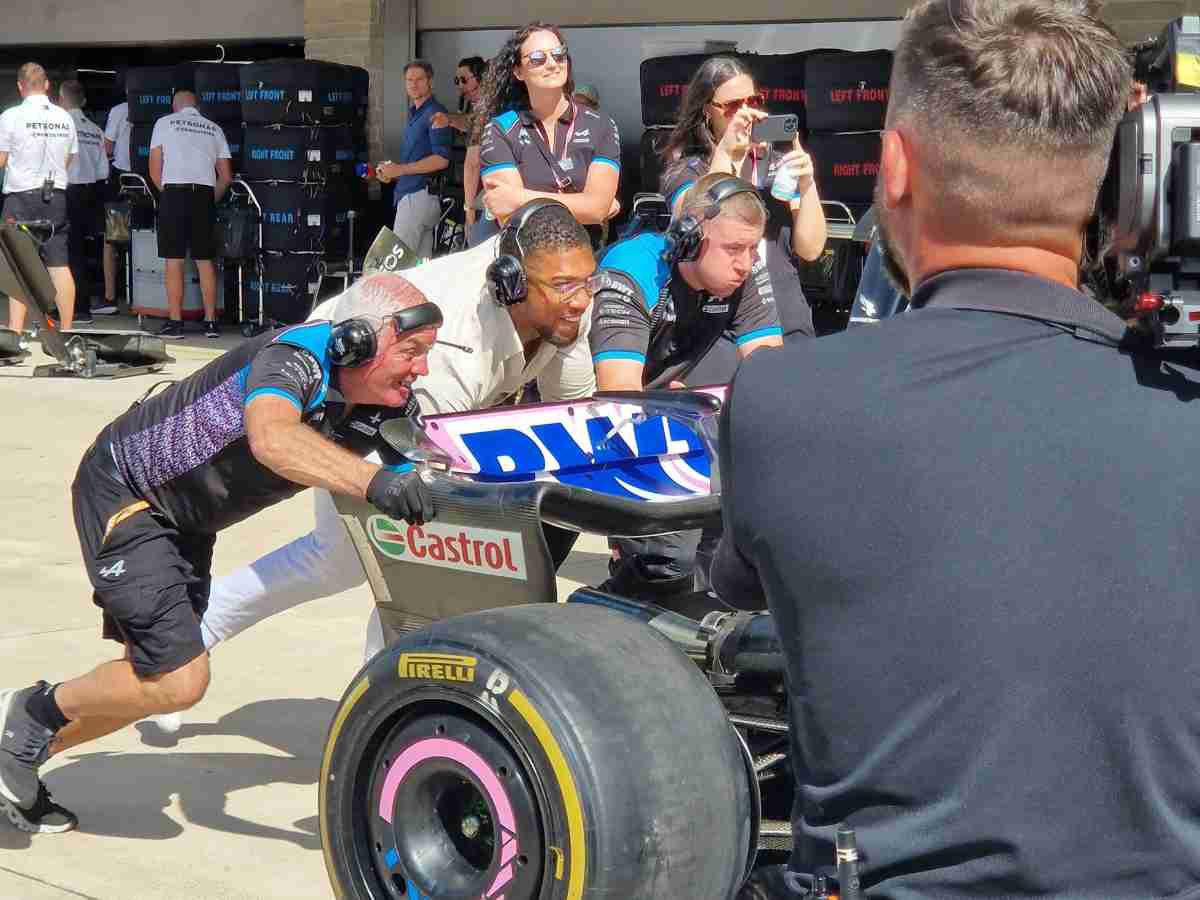 WATCH: $80 Million worth boxer Anthony Joshua pushes Esteban Ocon’s Alpine F1 car at US GP