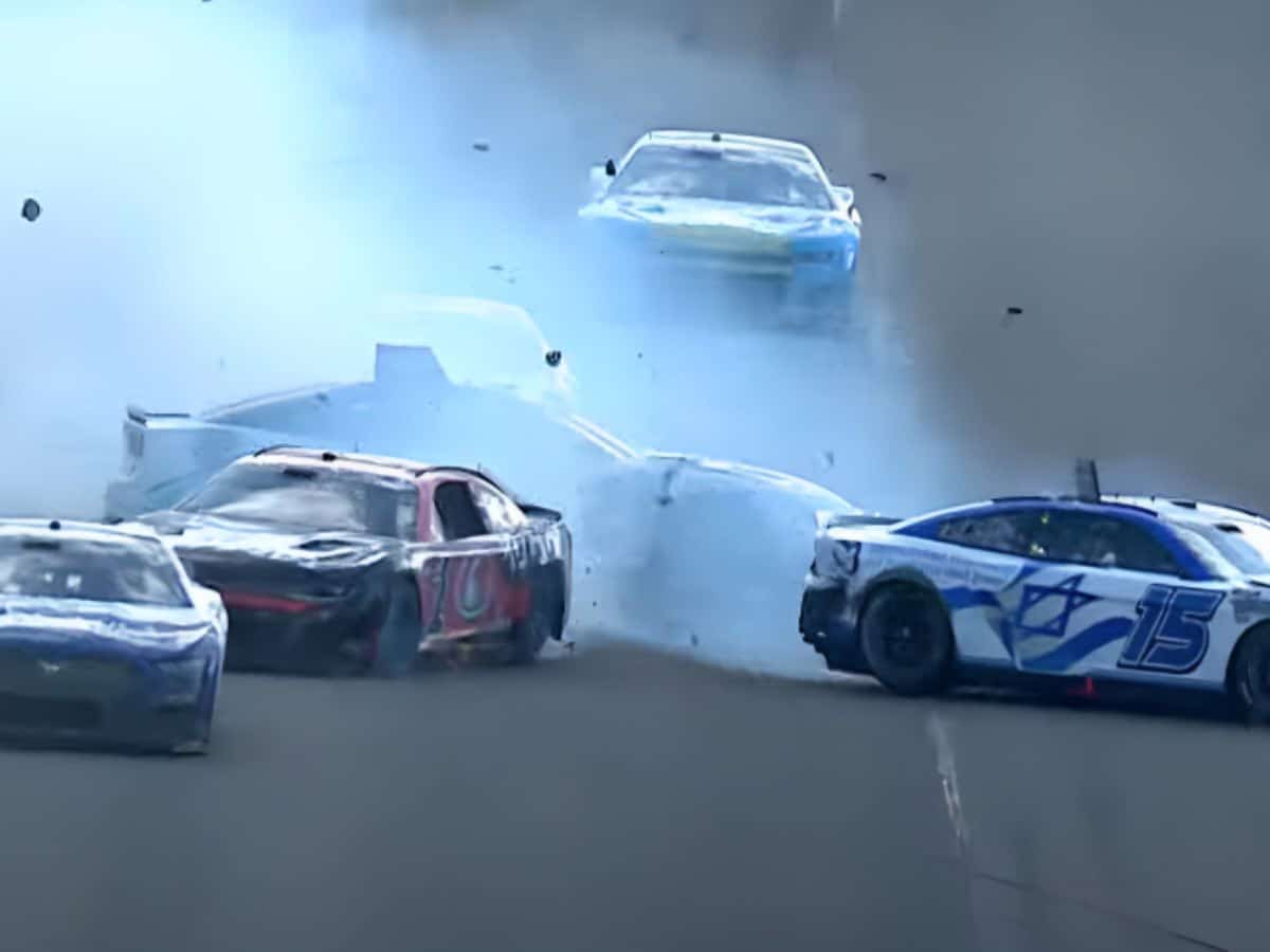 WATCH: “Down goes the war crimes car”- Fans react as J.J. Yeley’s car with pro-Israel paint scheme involved in a multi-car mayhem in Homestead-Miami