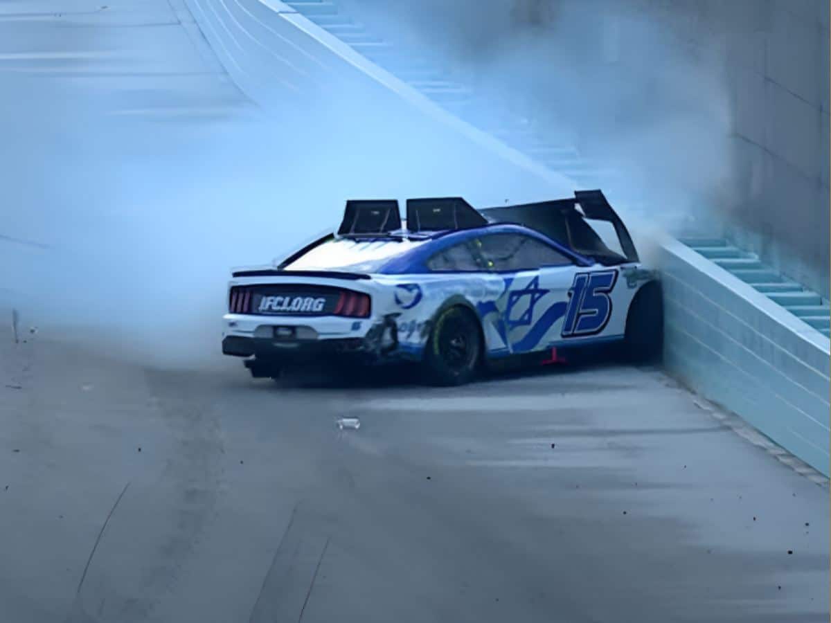 J.J. Yeley into the wall 