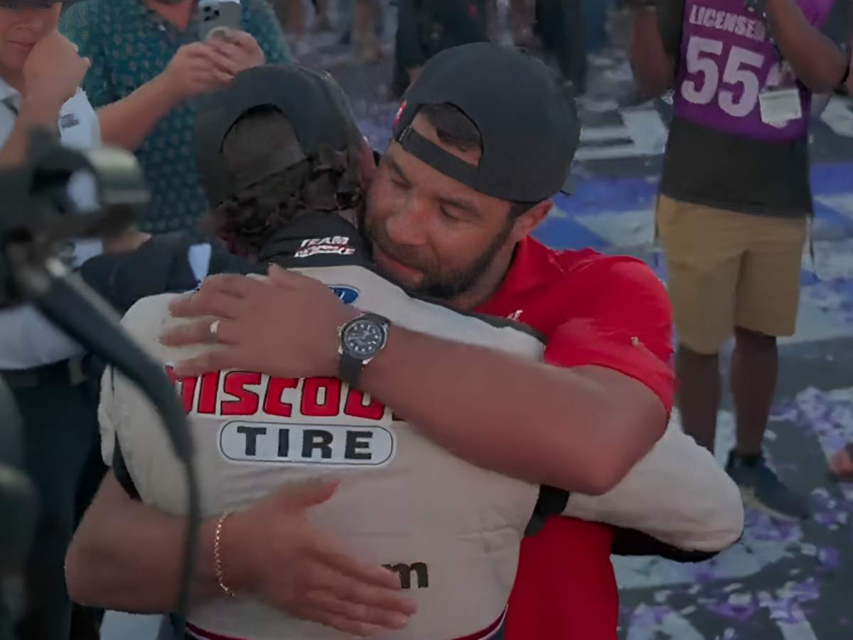 WATCH: “Another way for NASCAR to promote Bubba”- Fans react to Bubba Wallace hugging Ryan Blaney post-Martinsville win