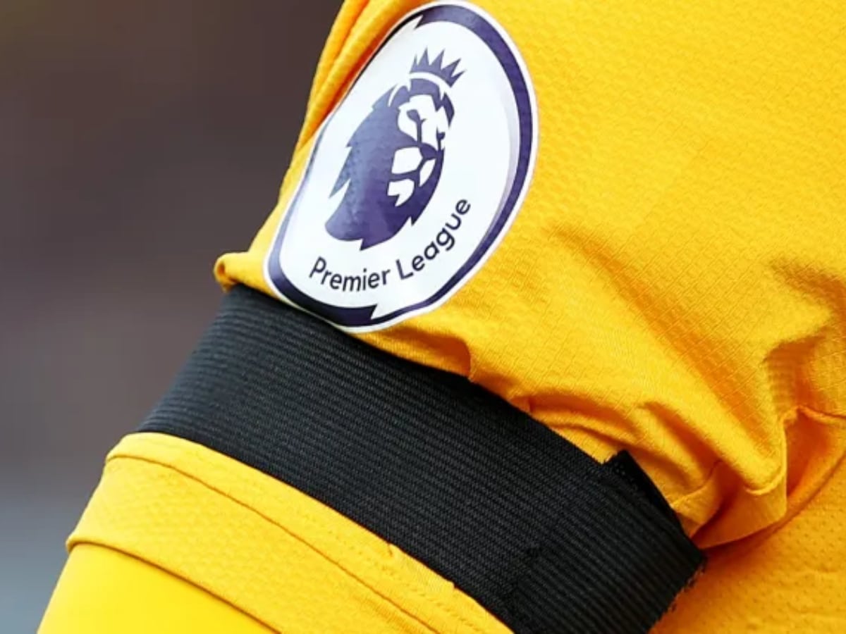 Premier League observes silence at each game over the weekend as players wear black armbands, bans Israel and Palestine flags