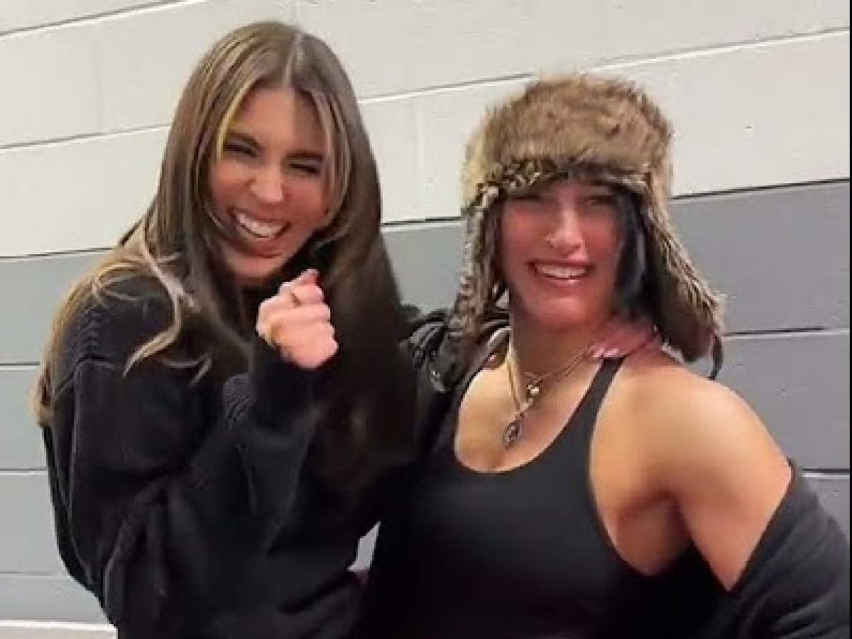 Rhea Ripley and Cathy Kelley 