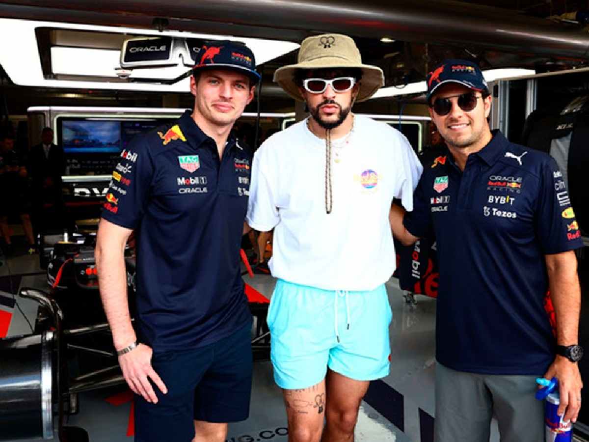 Max Verstappen, Bad Bunny and Sergio Perez in the Red Bull garage.