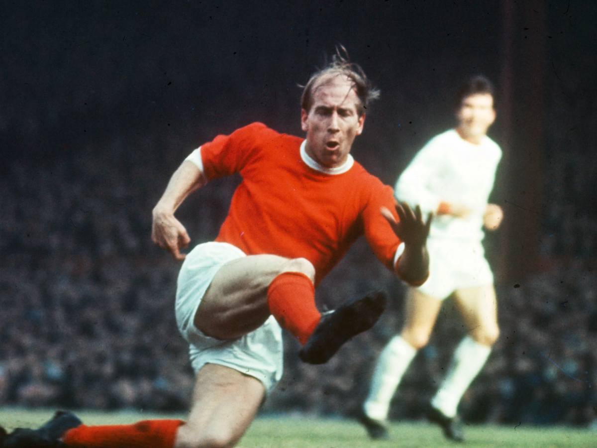 Sir Bobby Charlton in action for Manchester United 