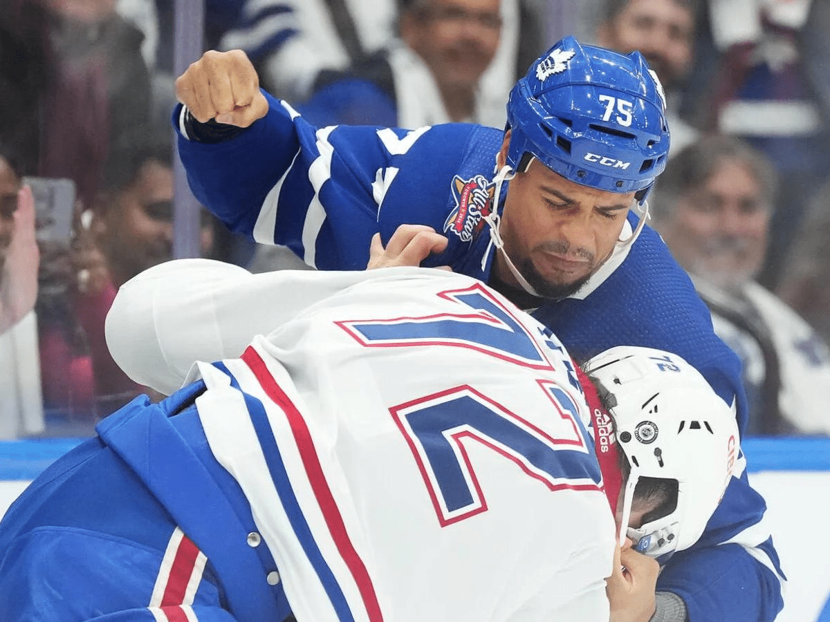 Ryan Reaves pummeling Arber Xhekaj [Image Credit Yardbarker]