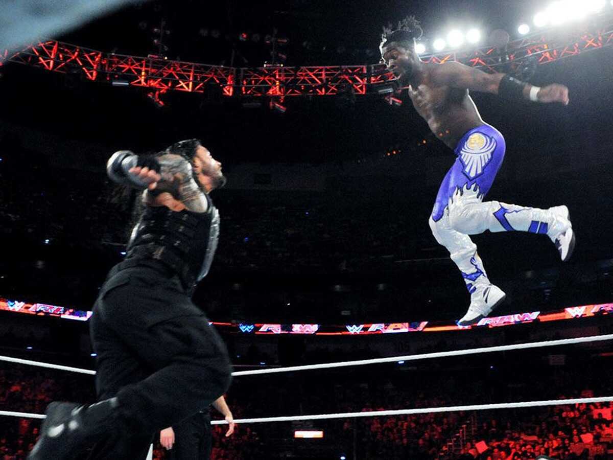 Roman Reigns and Kofi Kingston 