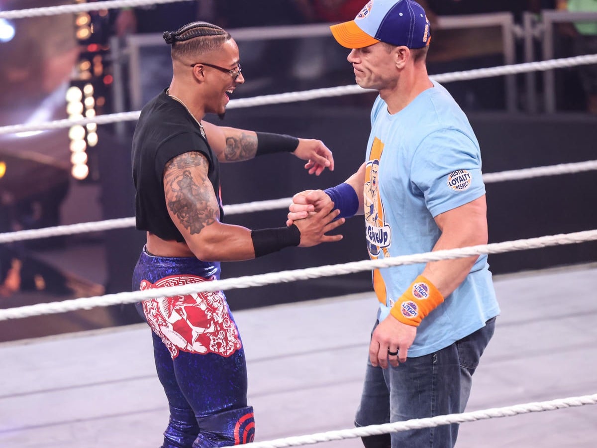 Carmelo Hayes and John Cena