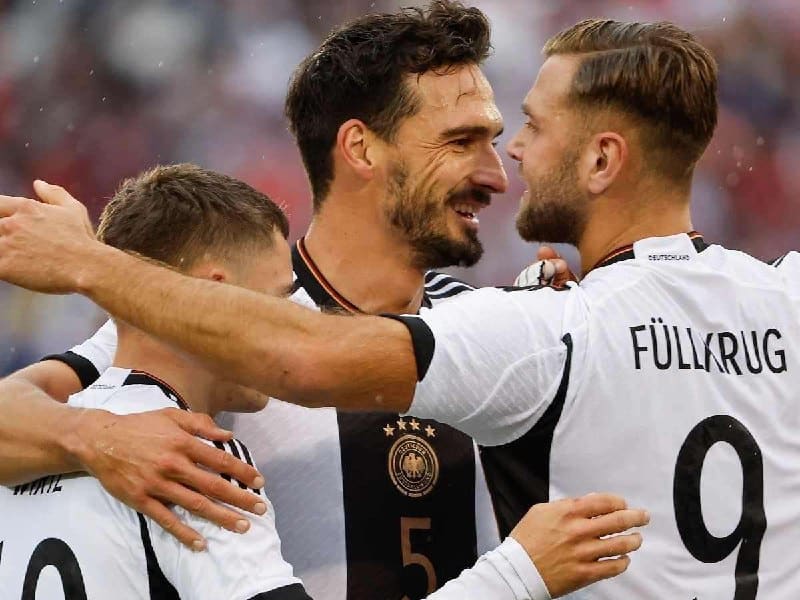 German Players celebrating a goal against the USA.