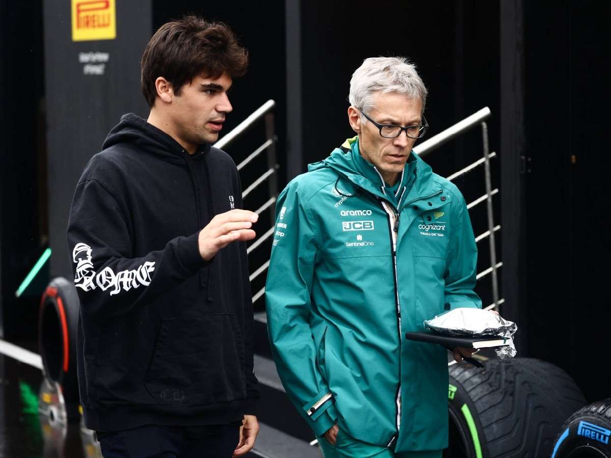 Aston Martin's Lance Stroll and Mike Krack