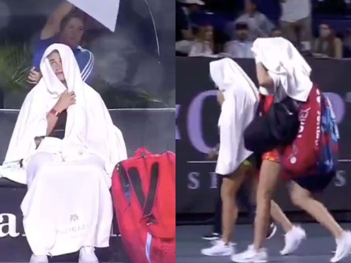 WATCH: Aryna Sabalenka and Elena Rybakina wrap themselves in towels and rush off the court as the decider clash at the WTA Finals 2023 gets suspended