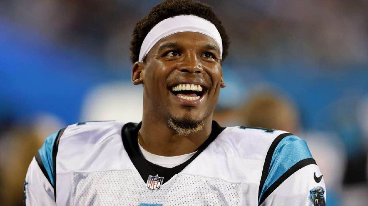 “Kiss my a**! Cam Newton reveals Jimmy Clausen demanded $1,000,000 just to change his #2 jersey number
