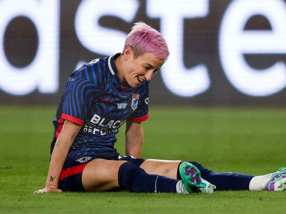 ‘Is she allowed to be helped by men’ – Fans flood HILARIOUS reactions as Megan Rapinoe had to be escorted off field by two men in her final career game