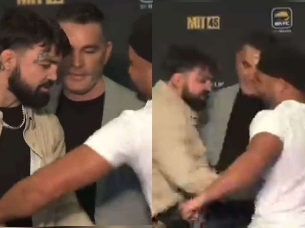 WATCH: Promotional face-off takes a BIZZARE turn as Mike Perry and Eddie Alvarez trade body shots at each other