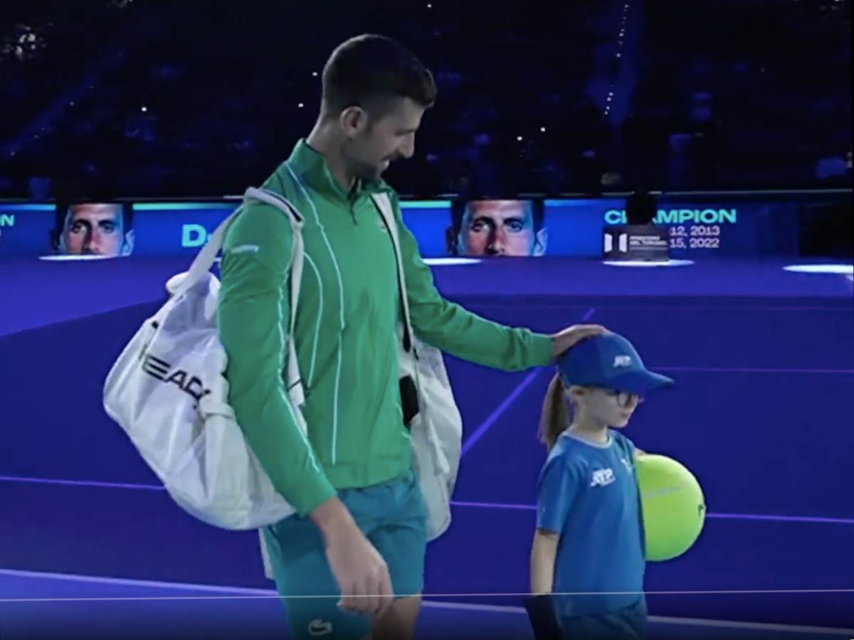 WATCH: Novak Djokovic has a heartwarming moment with a ballkid as he stops to listen to her prior to his 2023 ATP Finals opener