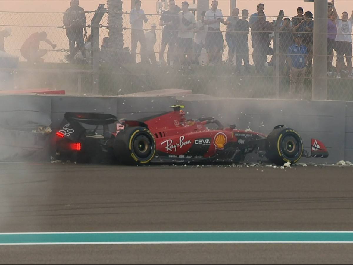 Carlos Sainz's Ferrari in the barriers