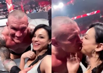 Randy Orton playing with his wife on Raw