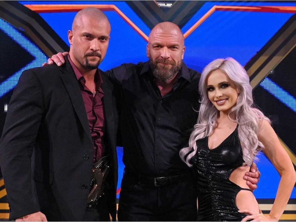 Triple H with Karrion Kross and Scarlett