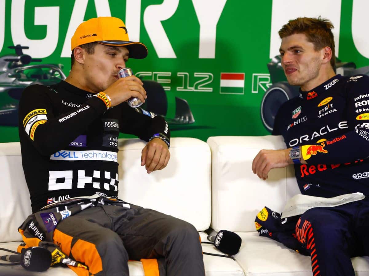 Lando Norris drinking Max Verstappen's Red Bull