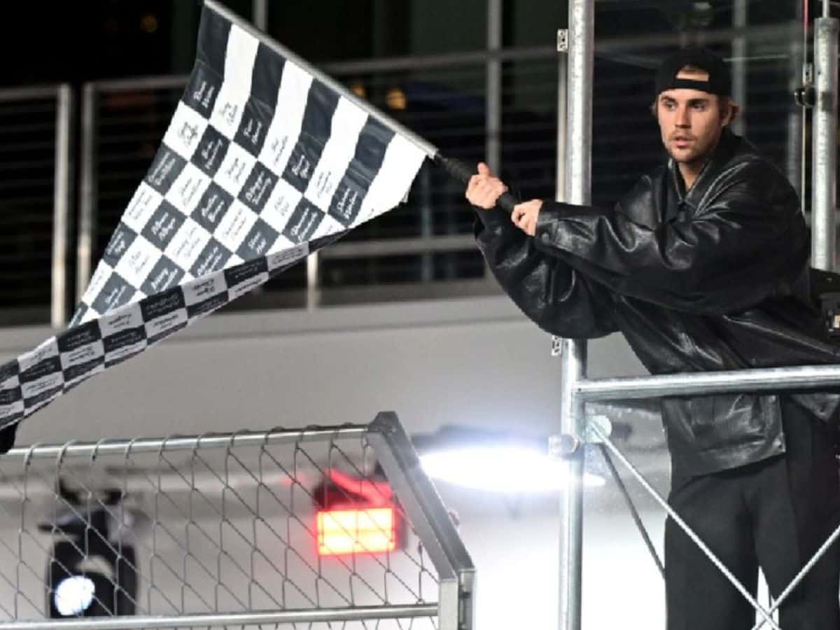 WATCH: $300 Million worth pop-star Justin Bieber waves the chequered flag at the Las Vegas GP