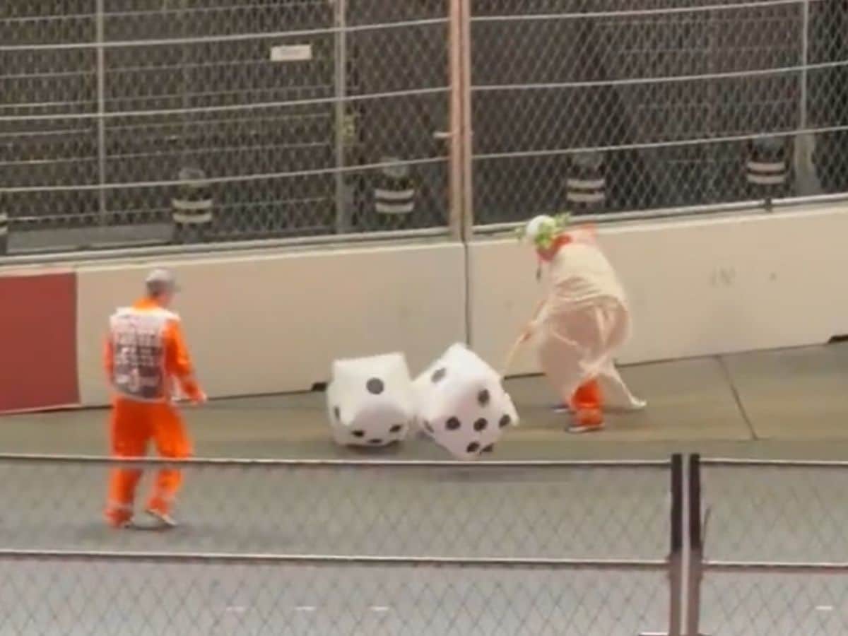 WATCH: Track Marshalls engage in their own game on the Strip Circuit with two giant dice after the Las Vegas Grand Prix