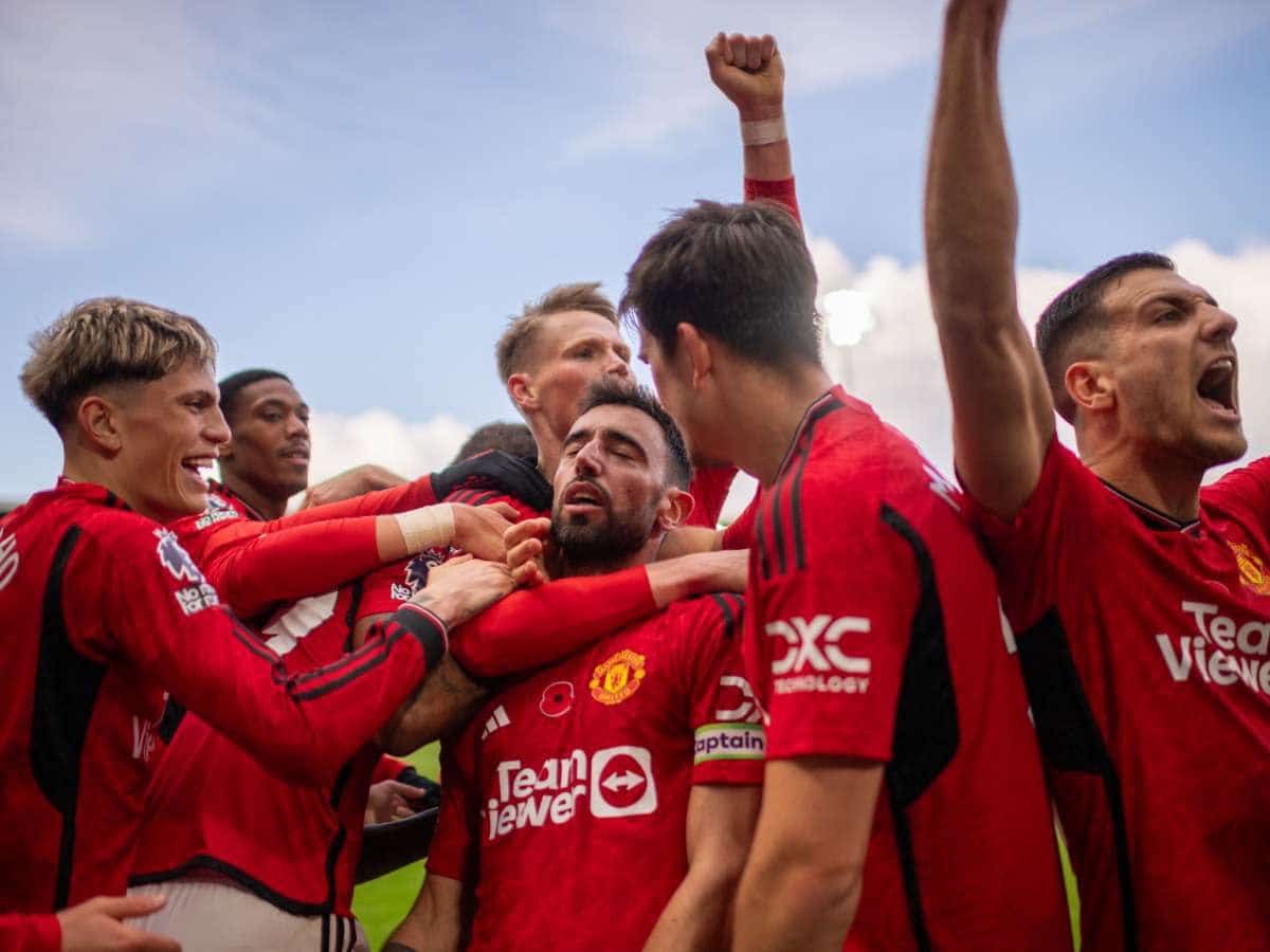 Bruno Fernandes surrounded by Manchester United players