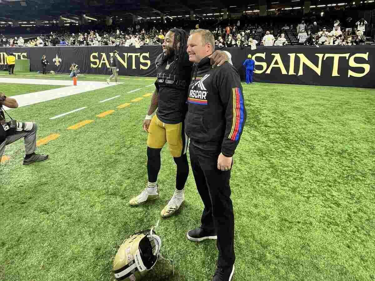 Reigning Xfinity Series Champion Cole Custer hangs out with Alvin Kamara at the Saints versus Panthers game