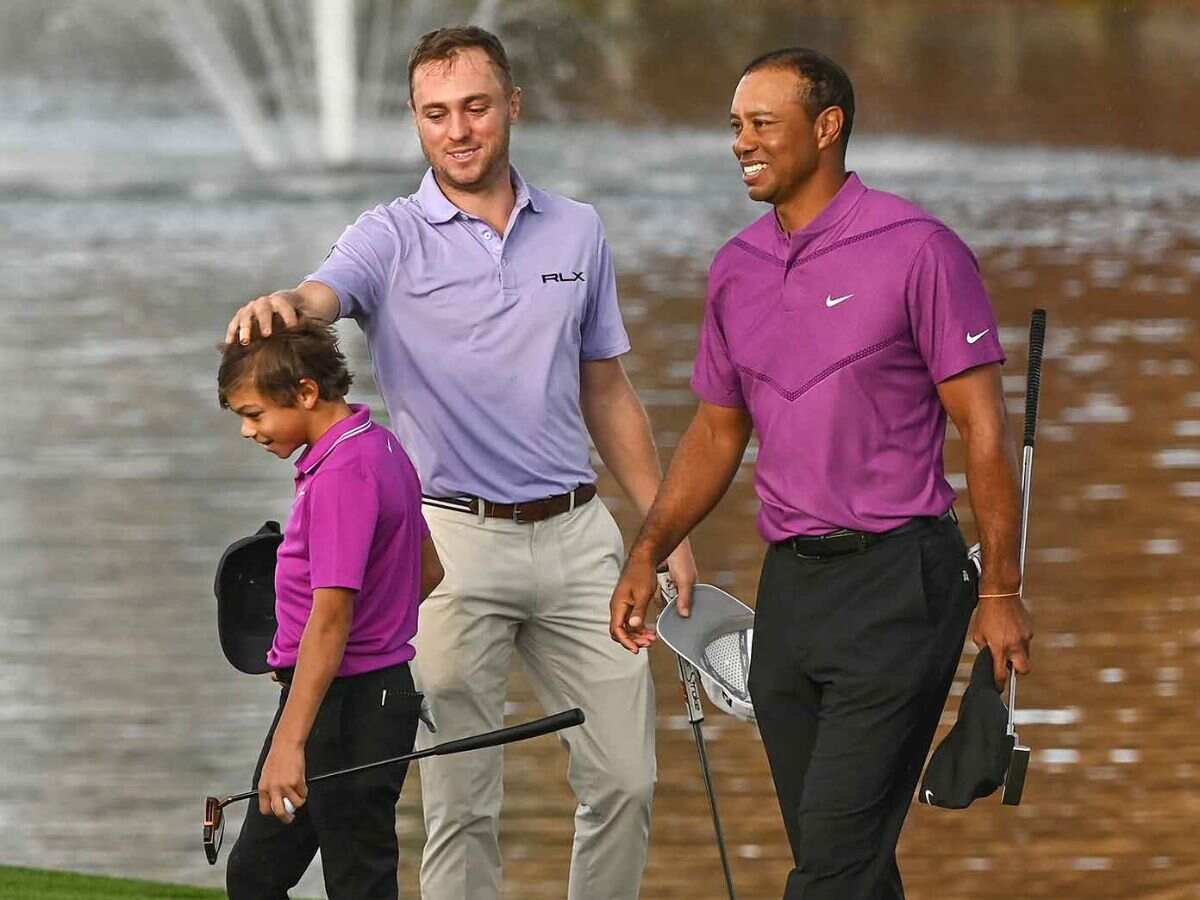 Charlie Woods, Justin Thomas and Tiger Woods