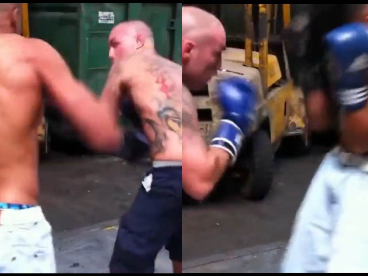 Factory workers boxing