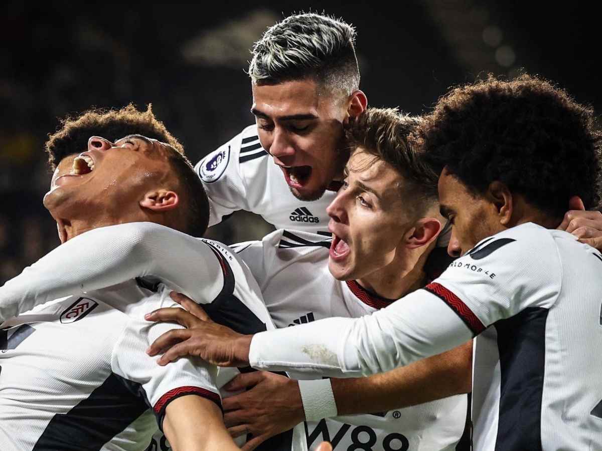 Fulham players celebrating their win over Arsenal