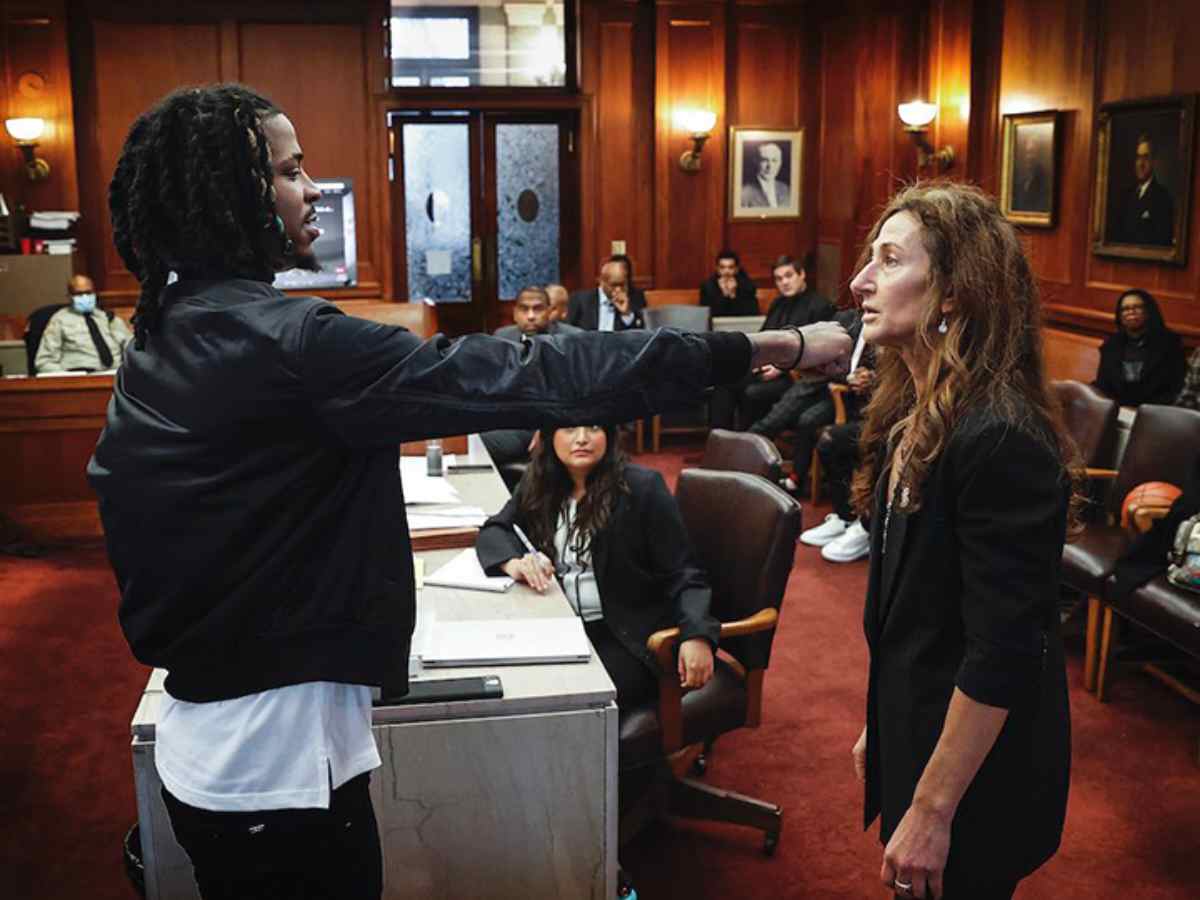 Ja Morant showing the opposition lawyer how he punched the teenager