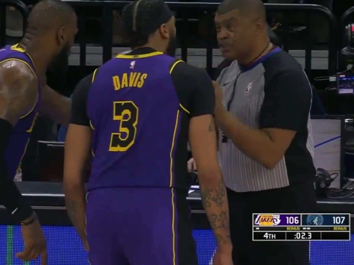 LeBron James, Anthony Davis and referee Tony Brothers arguing about the controversial call