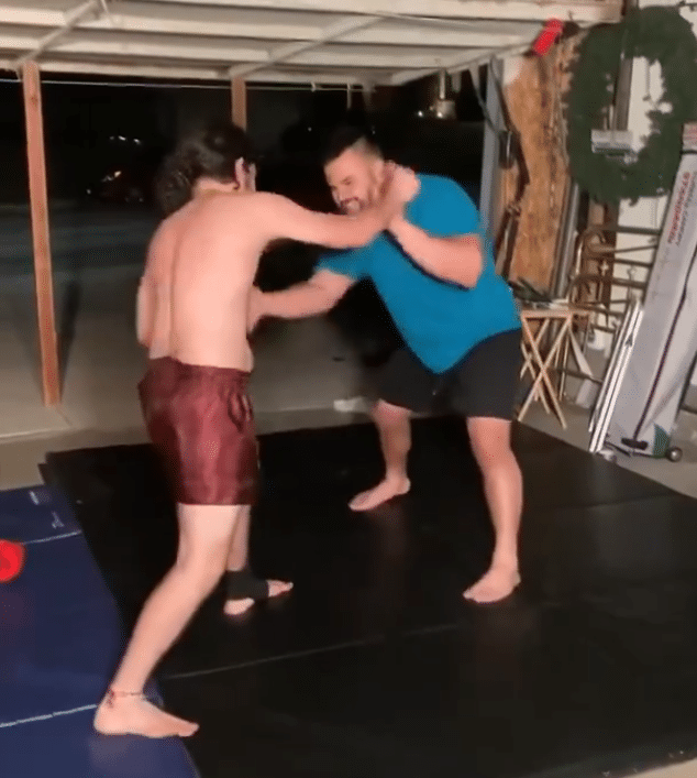 Fight fans react to 250 lb football player getting submitted by a  150 lb MMA fighter 