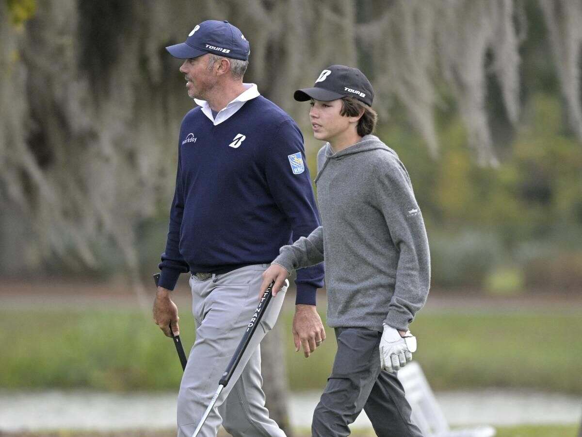 WATCH: Matt Kuchar and his son Cameron DOMINATE PNC Championship by leading with 3 shots despite rainy hurdles