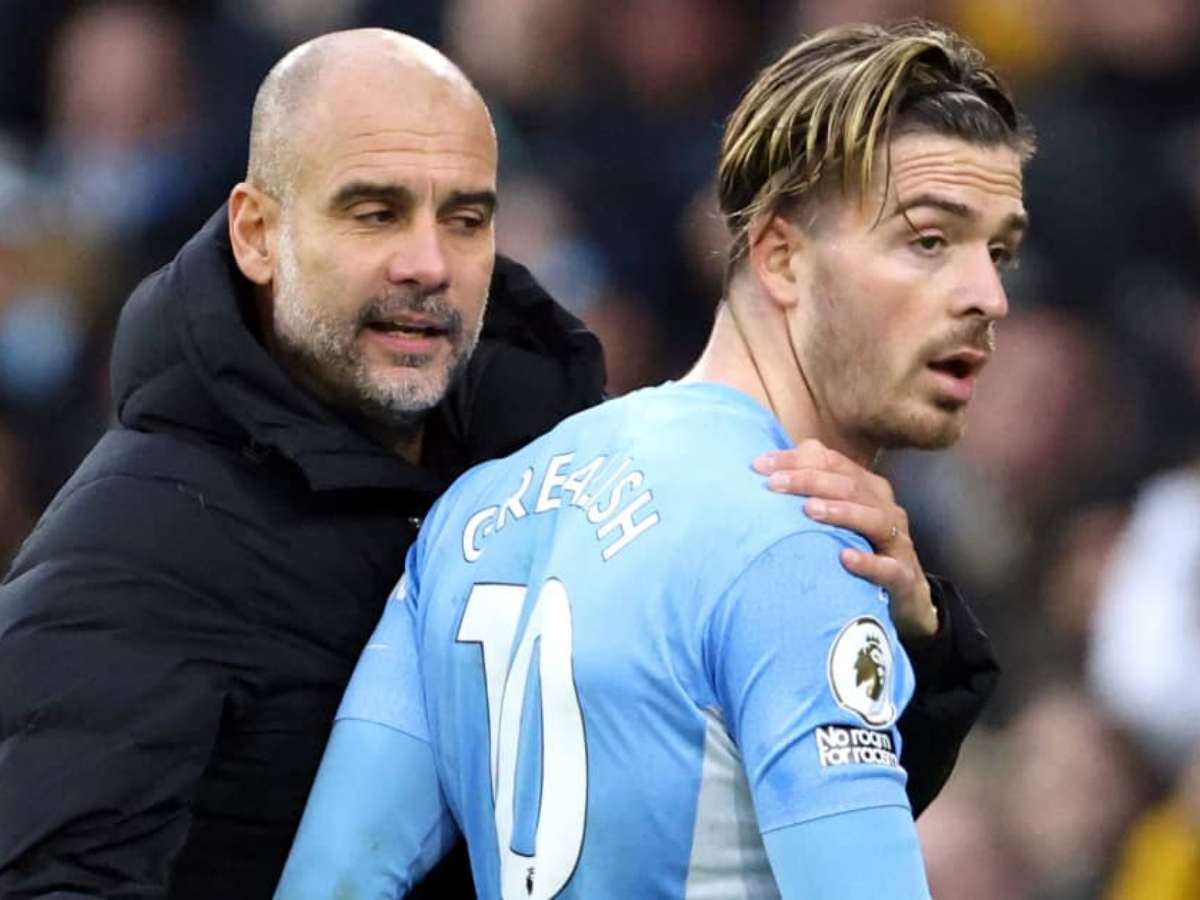 Pep Guardiola and Jack Grealish 