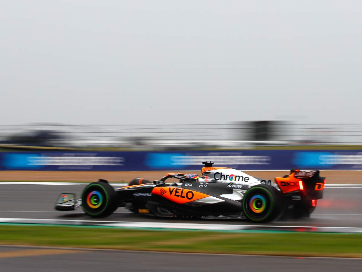 Oscar Piastri driving the Chrome MCL60 at Silverstone