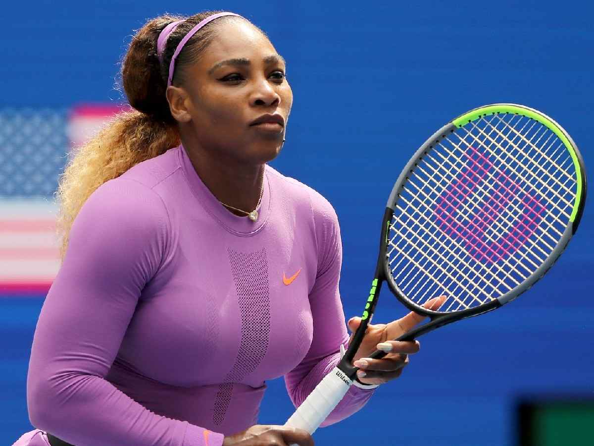 The Williams sisters is seen drying practice court after rain spoils their plan