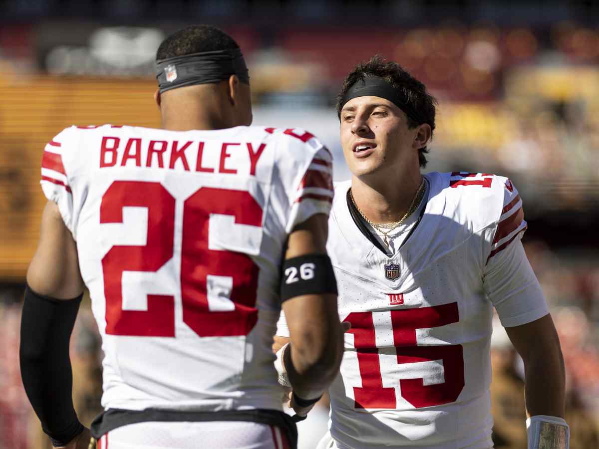 Tommy DeVito with Saquon Barkley