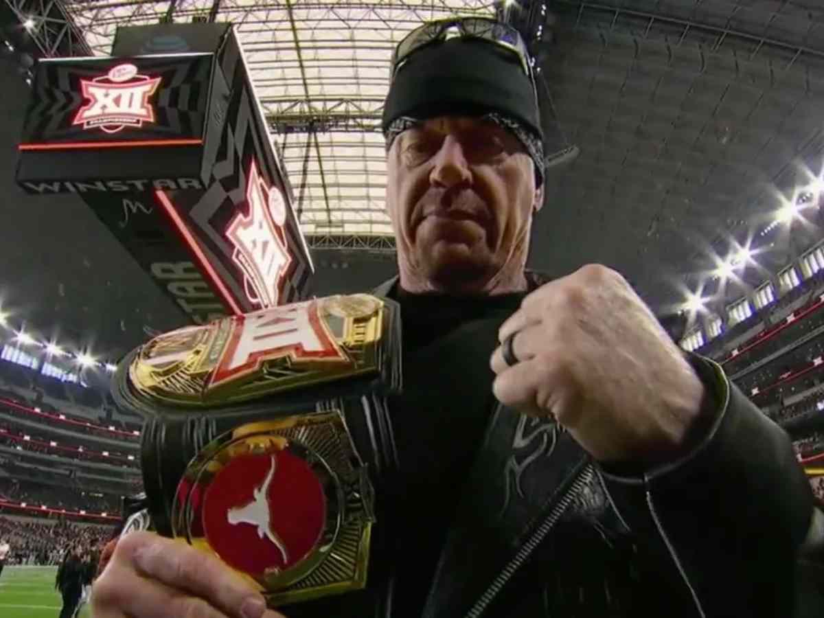 WATCH: The Undertaker shows off the WWE-style title to be presented to the winner of the Big 12 championship game between Oklahoma State and Texas