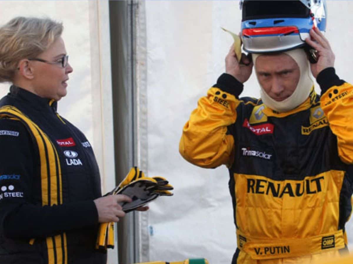 President Putin in Renault overalls, readying for his first F1 car trip