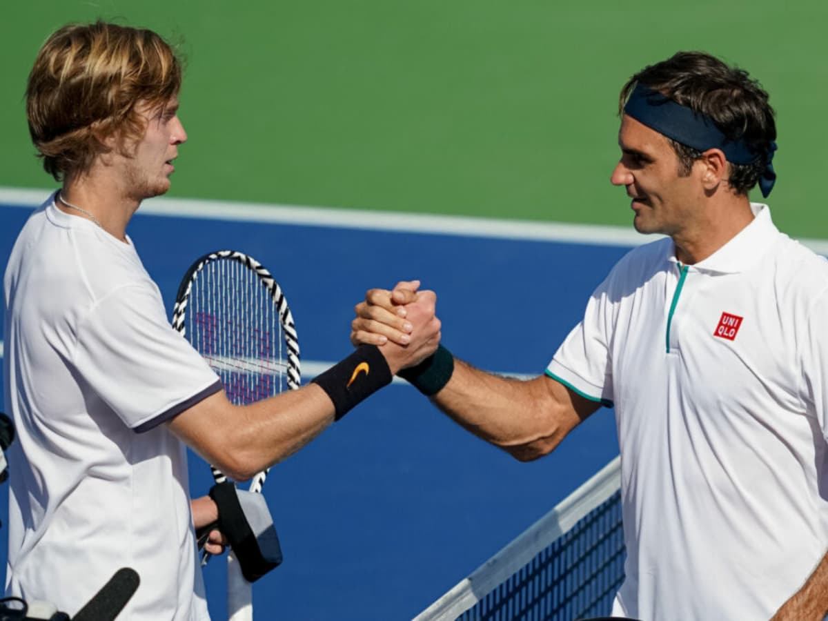 Andrey Rublev and Roger Federer