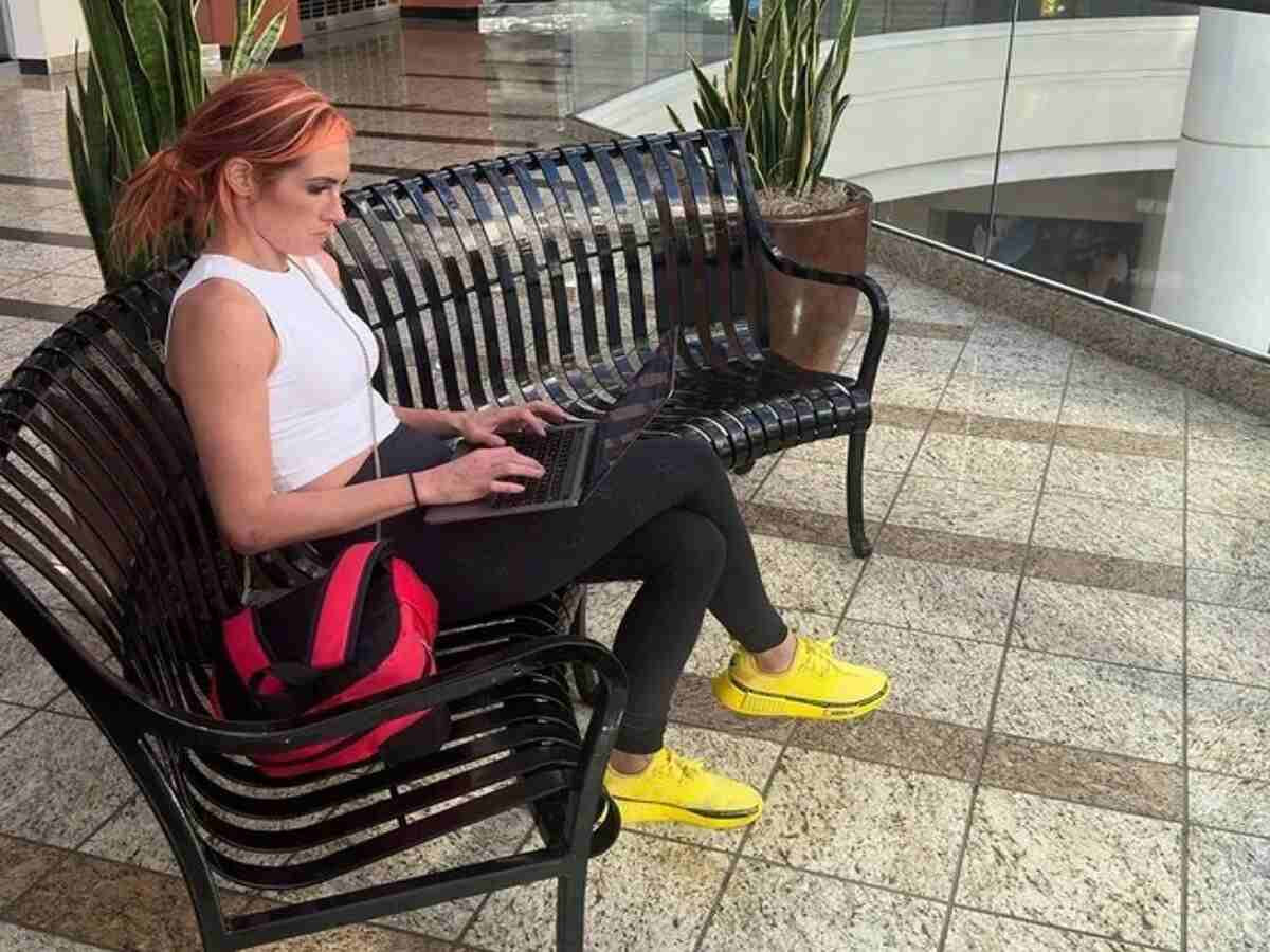 Becky Lynch on her laptop