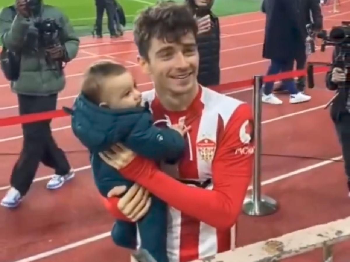 WATCH: Charles Leclerc creates a wholesome moment as he holds a baby after a soccer game