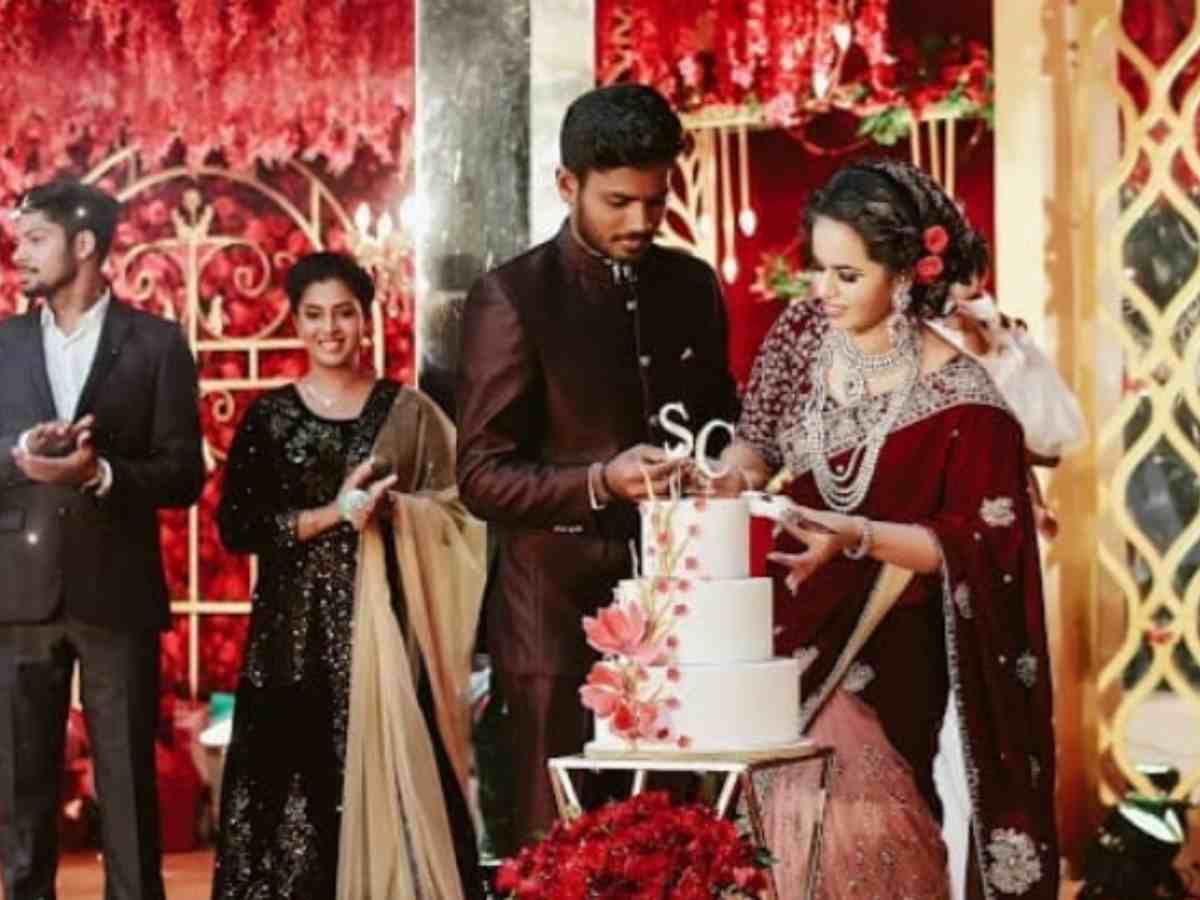 Sanju Samson with his wife (Image via Instagram)