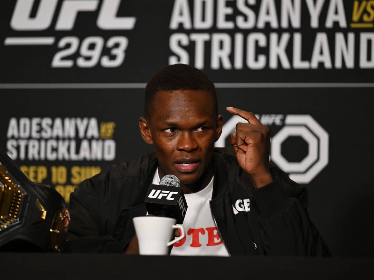 “Fans are reason he gets paid” – Israel Adesanya’s distaste for fans asking for pictures in public interactions gets bashed by netizens