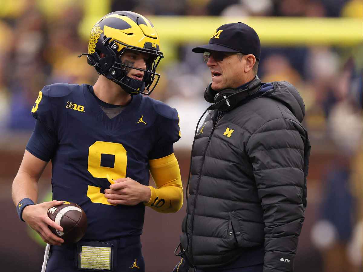 J.J. McCarthy and Jim Harbaugh