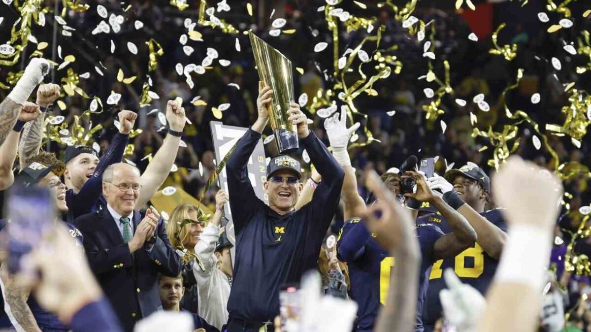 Jim Harbaugh lifting the title